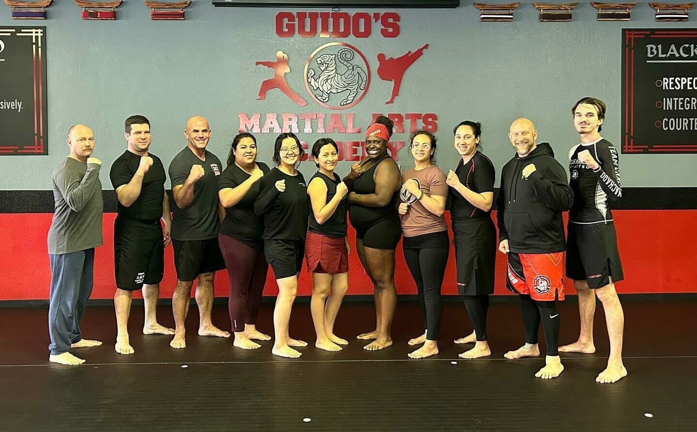 Adult MMA partner drills in class