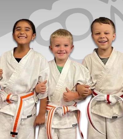 Big Ninjas students executing a kick in class
